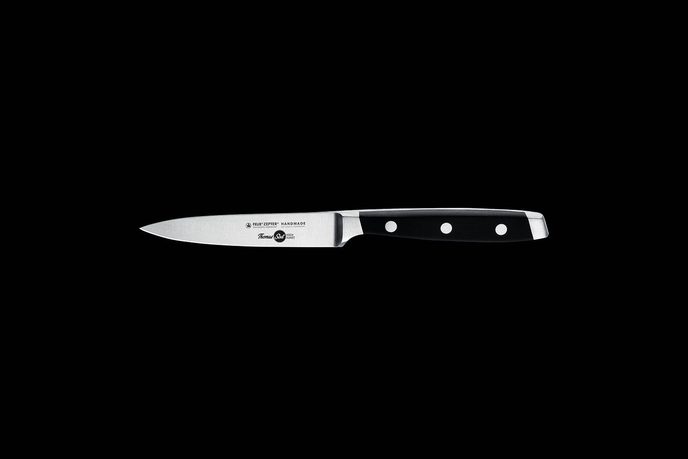 Kleines Officemesser mit 10 cm Klinge auf schwarzem Grund